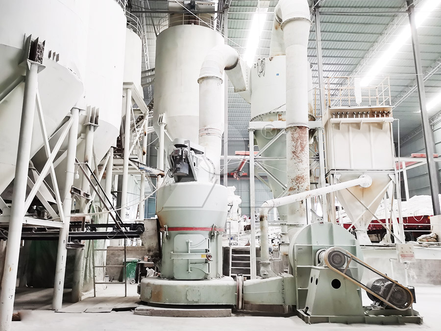 Modern gypsum processing plant in agricultural setting