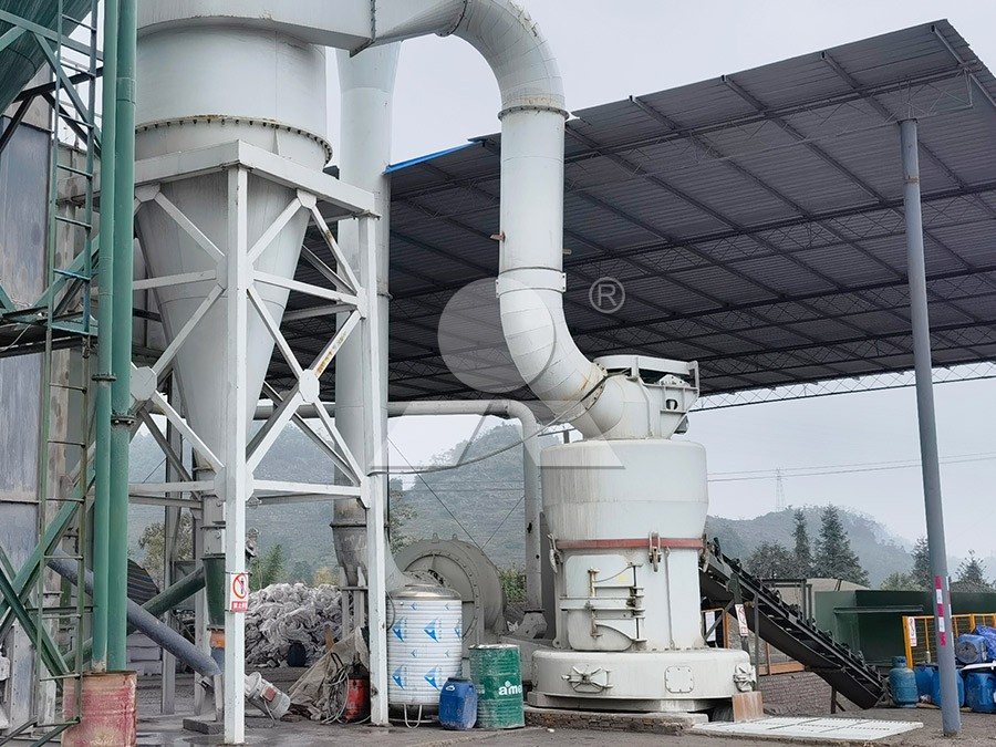 Modern mineral processing plant with grinding mills in operation