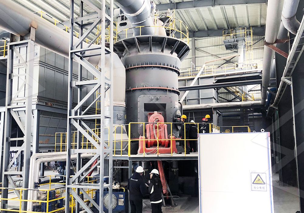 A modern industrial roller mill installation in a mineral processing plant.
