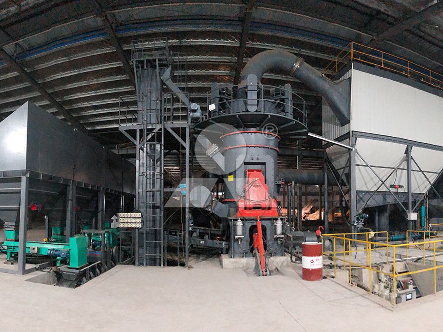 Installation view of a large LM Vertical Grinding Mill in an industrial setting, showing its compact footprint.