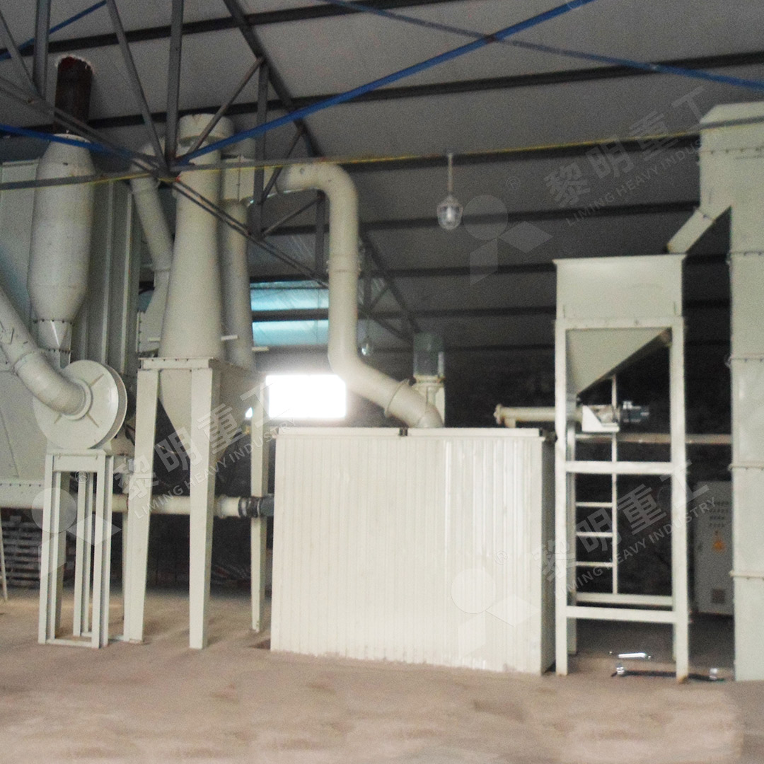 Industrial installation of an MW Ultrafine Grinding Mill in a mineral processing plant, showing its compact structure.