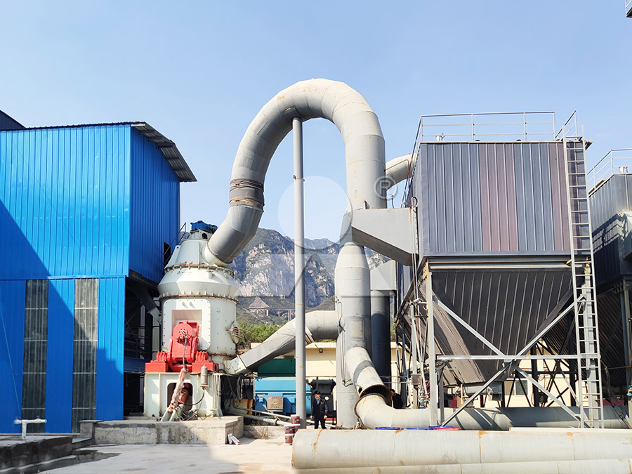 Industrial coal grinding mill installed in a power plant facility for fuel preparation