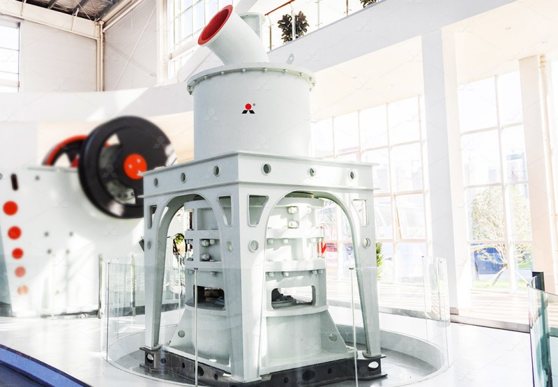 MW Ultrafine Grinding Mill installed in a Bolivian mining plant with dust collector and piping visible