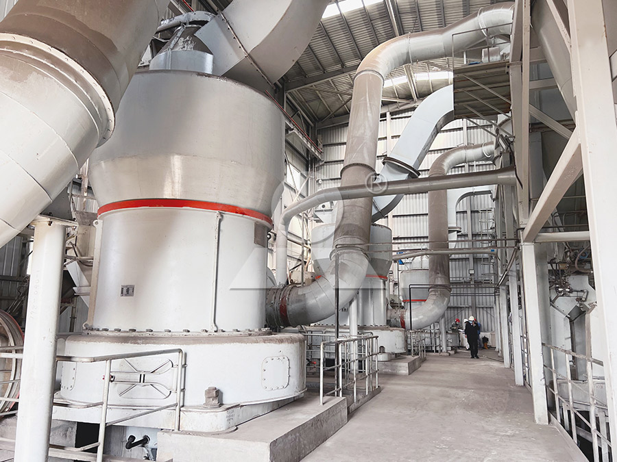 Quality control testing of gypsum powder fineness using a sieve and weighing scale in an Oman factory